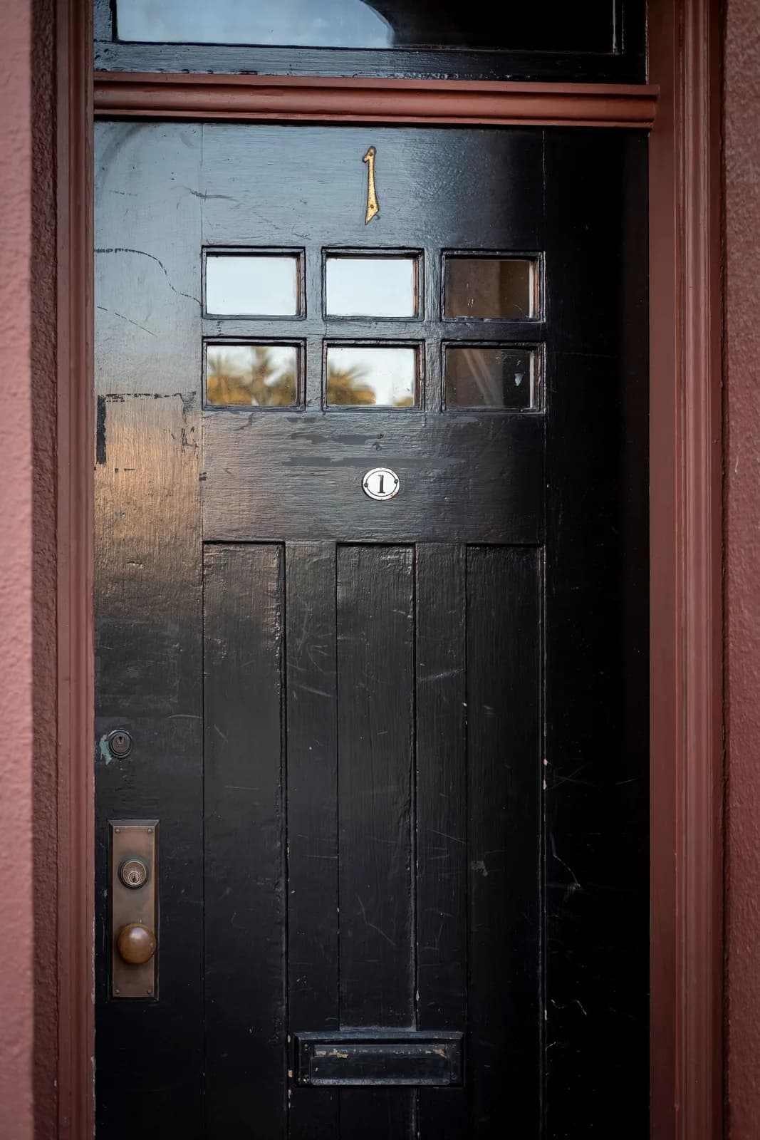 Wooden entrance door with glazing