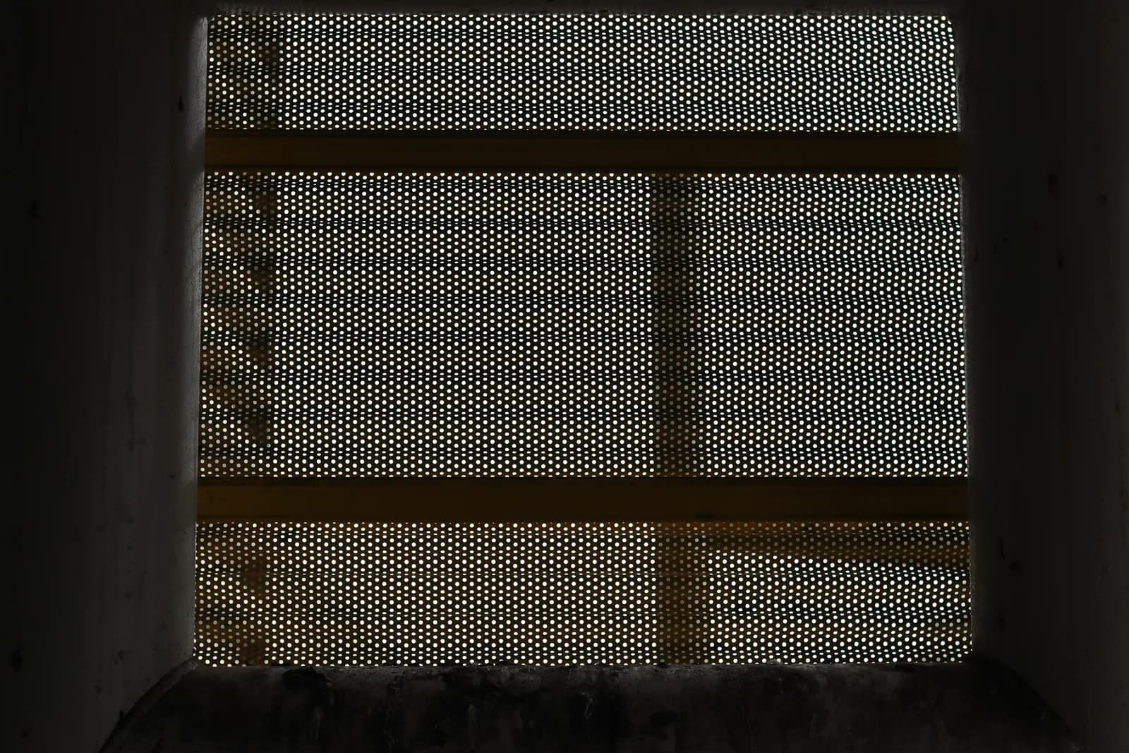Light passing through a fine window screen mesh